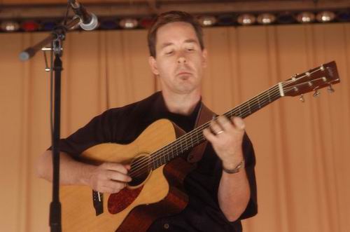 Pete Huttlinger at Unknown Venue Somewhere, US on June 24, 2003 &mdash; concert photo by Wayne Dennon