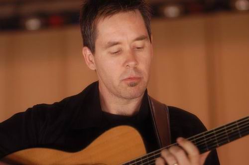 Pete Huttlinger at Unknown Venue Somewhere, US on June 24, 2003 &mdash; concert photo by Wayne Dennon