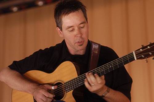 Pete Huttlinger at Unknown Venue Somewhere, US on June 24, 2003 &mdash; concert photo by Wayne Dennon