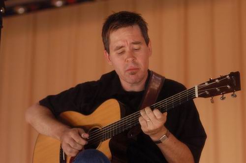 Pete Huttlinger at Unknown Venue Somewhere, US on June 24, 2003 &mdash; concert photo by Wayne Dennon