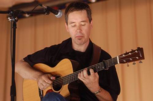 Pete Huttlinger at Unknown Venue Somewhere, US on June 24, 2003 &mdash; concert photo by Wayne Dennon