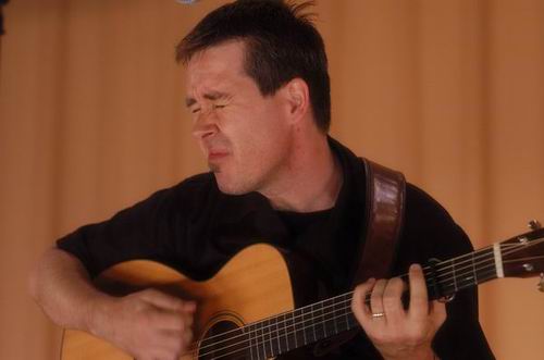 Pete Huttlinger at Unknown Venue Somewhere, US on June 24, 2003 &mdash; concert photo by Wayne Dennon