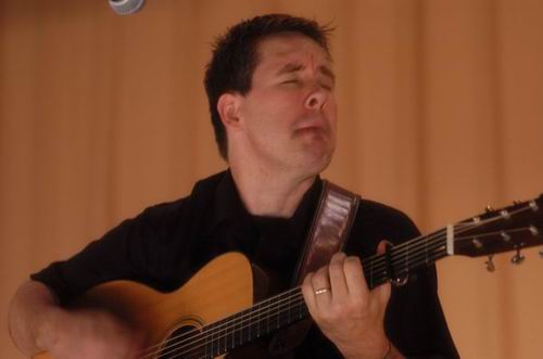 Pete Huttlinger at Unknown Venue Somewhere, US on June 24, 2003 &mdash; concert photo by Wayne Dennon