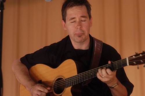 Pete Huttlinger at Unknown Venue Somewhere, US on June 24, 2003 &mdash; concert photo by Wayne Dennon