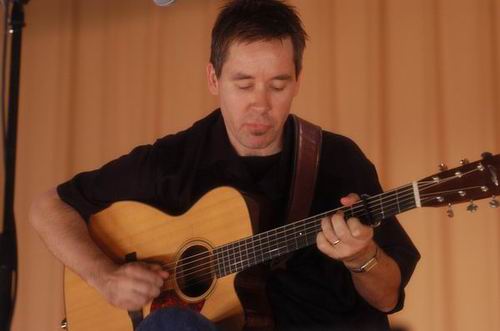 Pete Huttlinger at Unknown Venue Somewhere, US on June 24, 2003 &mdash; concert photo by Wayne Dennon