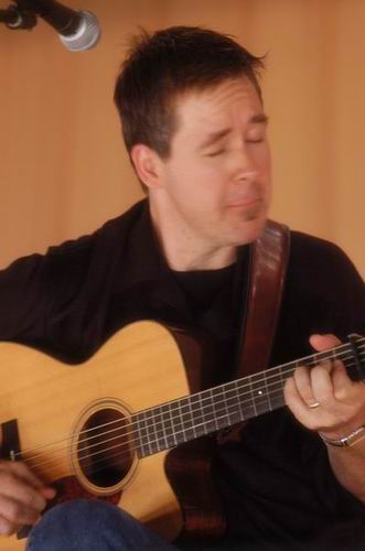 Pete Huttlinger at Unknown Venue Somewhere, US on June 24, 2003 &mdash; concert photo by Wayne Dennon